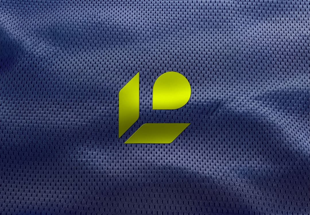 Metallic Sports Logo Mockup on Blue Jersey Fabric
