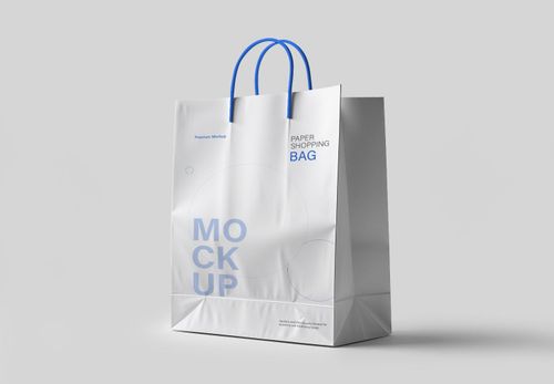 White Paper Shopping Bag Mockup with Blue Handles - Premium Branding Template