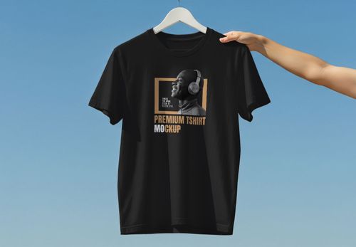 Black T-Shirt Mockup with Hand & Hanger - Premium Design Presentation